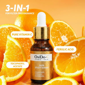 OxiDo-C Vitamin C serum bottle with gold cap surrounded by fresh orange slices, highlighting pure vitamin C, ferulic acid, and tocopheryl acetate for skin brightening from Safrin Skin Care.