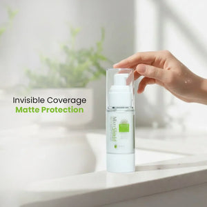 Hand picking up Safrin Skin Care Matte Shield sunscreen bottle on bathroom counter, text reads 'Invisible Coverage Matte Protection'.