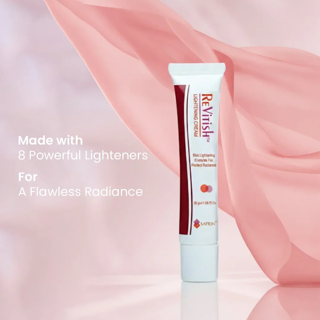 Safrin Skin Care Revinish Lightening Cream tube with soft pink fabric, product benefits text