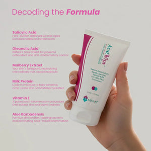 Hand holding Safrin Skin Care Acne Wipe cleanser tube with key ingredients and benefits listed.